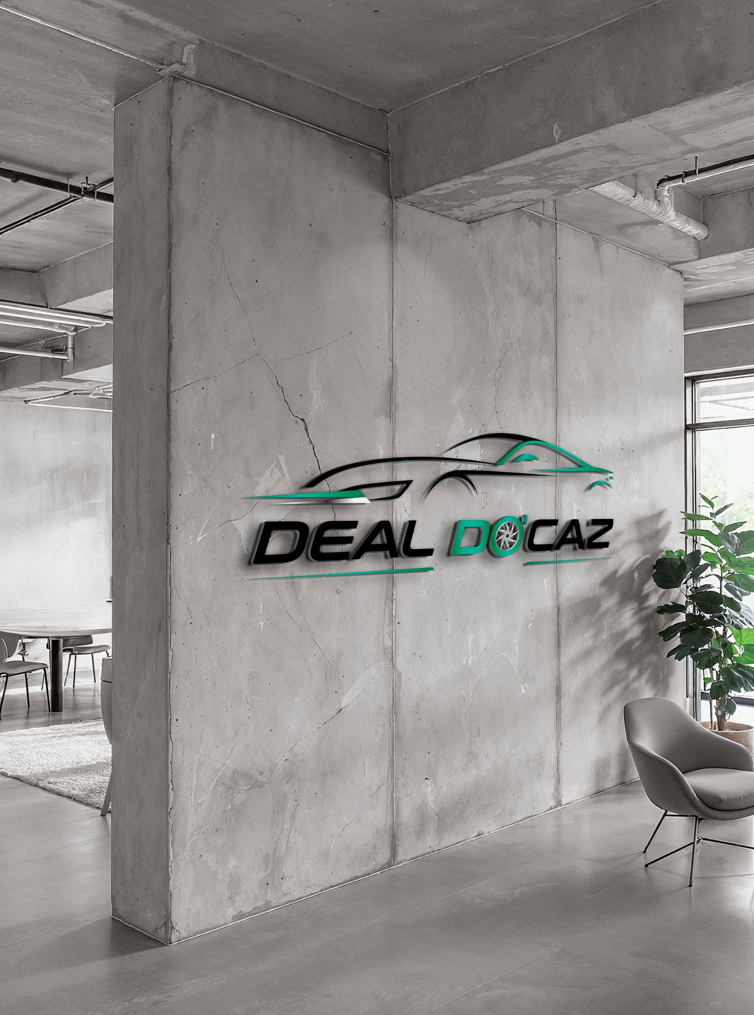 Le logo DEAL DO'CAZ sur un mur en béton